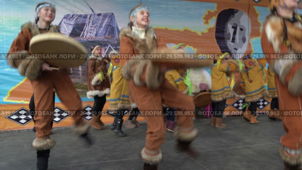 Girls in national clothing indigenous Kamchatka dancing and beats tambourine (2018 год). Редакционное видео, видеограф А. А. Пирагис / Фотобанк Лори