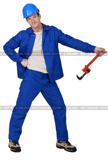Goofy tradesman holding a pipe wrench. Стоковое фото, фотограф Phovoir Images / Фотобанк Лори