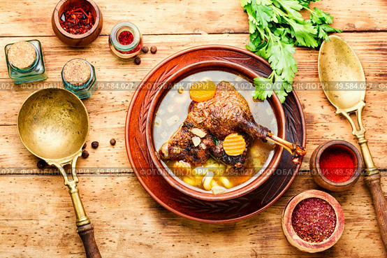 Goose soup with vegetables and pasta. A bowl of duck soup.. Appetizing goose soup. Стоковое фото, агентство Ingram Publishing / Фотобанк Лори