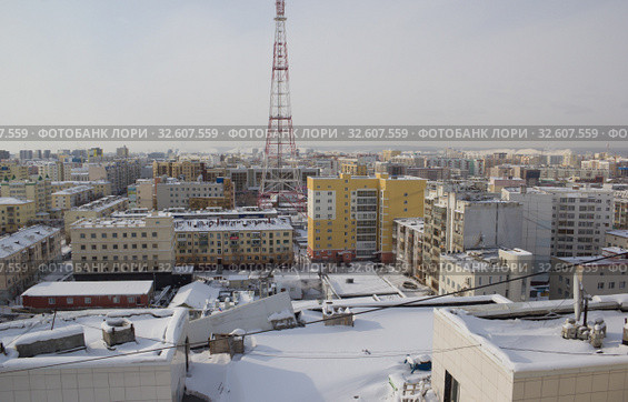 Город Якутск зимой. Вид сверху (2019 год). Редакционное фото, фотограф Олег Хархан / Фотобанк Лори