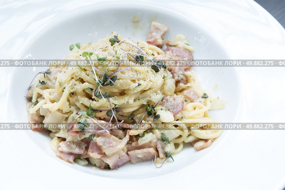 gourmet spaghetti carbonara italian cuisine. Стоковое фото, агентство Ingram Publishing / Фотобанк Лори