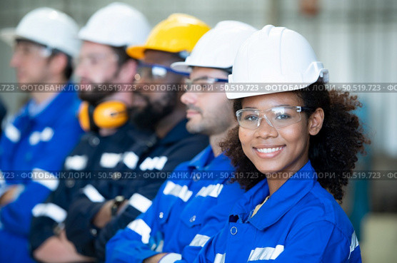Group of emotional engineers who take pleasure in the achievement of the responsible project’s work. Стоковое фото, агентство Ingram Publishing / Фотобанк Лори