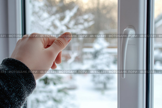 Hand on New plastic PVC window with white metal frame installed at modern house. View of blurred winter snow, blue sky. Advertising. Typical installation of glazing windows with uPVC window frames. Стоковое AI-изображение, AI-художник Марина Демидюк / Фотобанк Лори