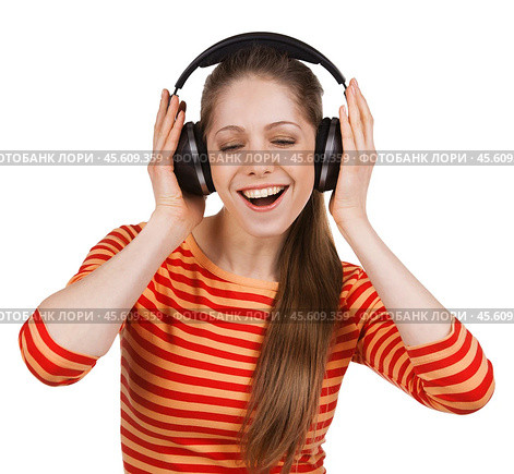 Happy girl listens to music on headphones. Стоковое фото, фотограф Дмитрий Киселёв / Фотобанк Лори