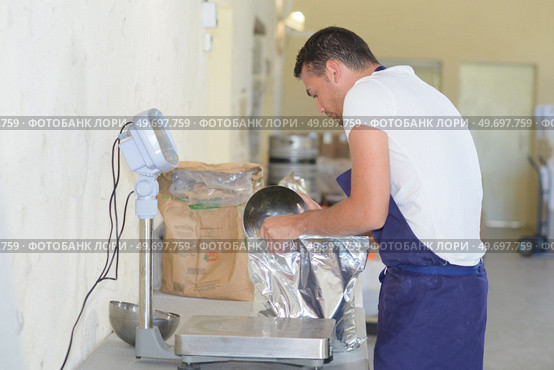 he is working in food factory. Стоковое фото, агентство Ingram Publishing / Фотобанк Лори