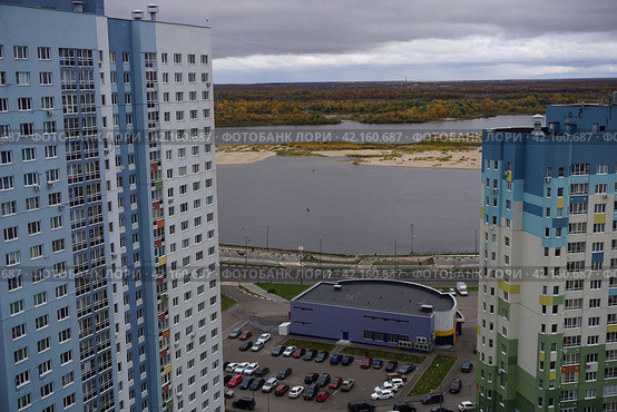 High apartment buildings in the metropolis. City by the river. (2018 год). Стоковое фото, фотограф Egor Sarantstv / Фотобанк Лори