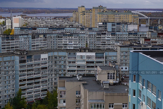 High apartment buildings in the metropolis. City by the river. (2018 год). Стоковое фото, фотограф Egor Sarantstv / Фотобанк Лори