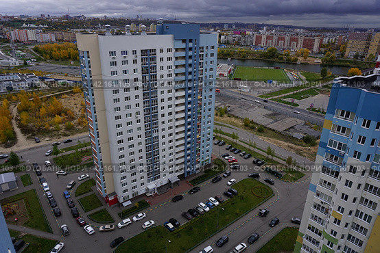 High apartment buildings in the metropolis. City by the river. (2018 год). Стоковое фото, фотограф Egor Sarantstv / Фотобанк Лори