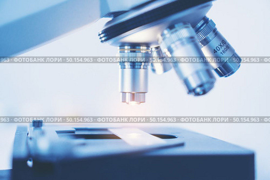 High magnification lens of the microscope for research. Стоковое фото, агентство Ingram Publishing / Фотобанк Лори