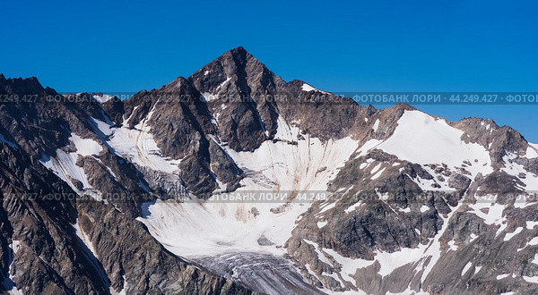 Highlands landscape, view of massive glacier on mountain cirque. Стоковое фото, фотограф Евгений Харитонов / Фотобанк Лори