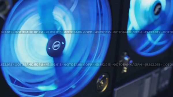 Highspeed spinning cooling fans with vibrant blue led lights. Стоковое AI-видео, аниматор Владимир Федоров / Фотобанк Лори