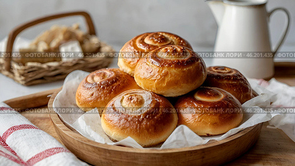 Homemade fresh pastries on the kitchen table. Fresh delicious buns in the bakery. Freshly baked pastry made from flour. Стоковое AI-изображение, AI-художник Photojuli / Фотобанк Лори