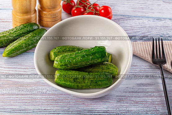 Homemade lightly salted cucumbers snack. Стоковое фото, фотограф Андрей Старостин / Фотобанк Лори