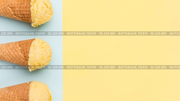 ice cream cones different color background. High resolution photo. ice cream cones different color background. High quality photo. Стоковое фото, агентство Ingram Publishing / Фотобанк Лори
