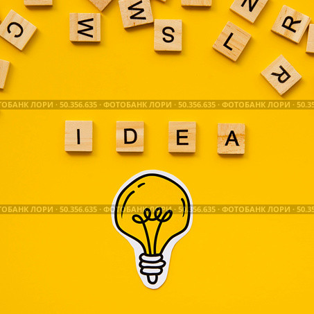 idea word from scrabble letters light bulb. Стоковое фото, агентство Ingram Publishing / Фотобанк Лори