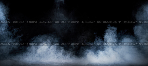 Image of dense smoke swirling in the dark interior. Стоковое фото, агентство Ingram Publishing / Фотобанк Лори