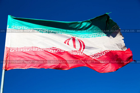 in iran blur  iranian waving flag  the blue sky and wind. Стоковое фото, агентство Ingram Publishing / Фотобанк Лори