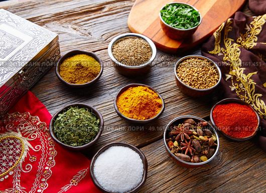 Indian cuisine spices mix as coriander curry  cardamom cumin. Стоковое фото, агентство Ingram Publishing / Фотобанк Лори