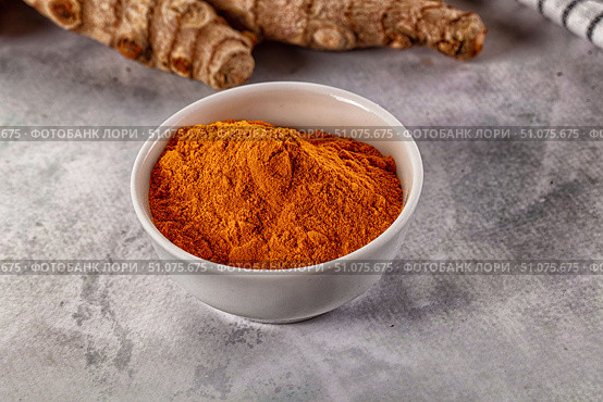Indian tumeric cumin dry powder. Стоковое фото, фотограф Андрей Старостин / Фотобанк Лори