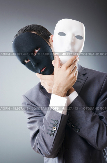 Industrial espionate concept with masked businessman. Стоковое фото, агентство Ingram Publishing / Фотобанк Лори