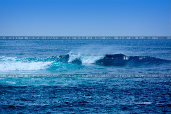 Jandia surf beach waves Fuerteventura at Canary Islands of Spain. Стоковое фото, агентство Ingram Publishing / Фотобанк Лори