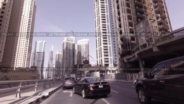 Journey on the roads among the skyscrapers of the fashionable district Dubai Marina stock footage video (2018 год). Редакционное видео, видеограф Юлия Машкова / Фотобанк Лори