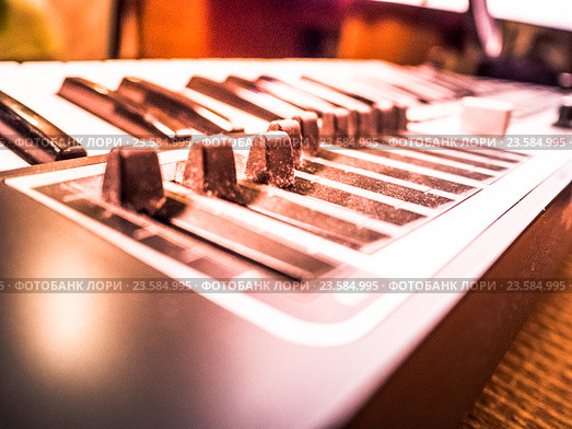 Keyboard of a synthesizer with sliders. Стоковое фото, фотограф Роман Гадицкий / Фотобанк Лори