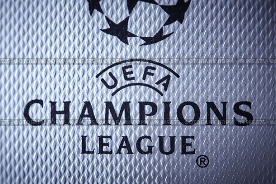 Kiev, Ukraine - February 22, 2018: Close-up inscription UEFA Champions League on the official Classic ball from adidas, final of the Champions League 2017-2018 will be held in Kiev on May 26.. Kiev, Ukraine - February 22, 2018: Close-up inscription UEFA Champions League on the official ball for the game in the final. Редакционное фото, агентство Ingram Publishing / Фотобанк Лори