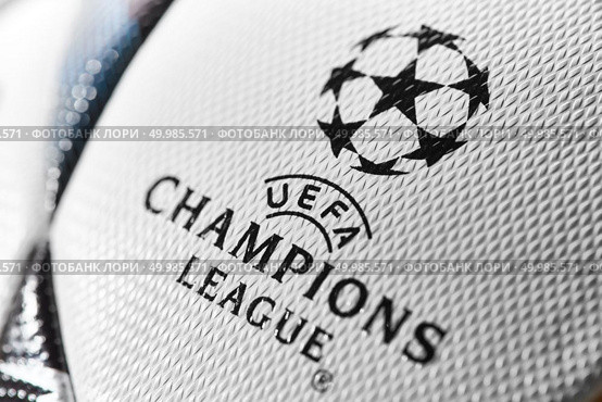 Kiev, Ukraine - February 22, 2018: Official UEFA Champions League 2018 season ball (Adidas Final Kiev) during UEFA Champions League game at NSC Olimpiyskyi stadium on May 26, 2018 in Kiev, Ukraine, close-up. Kiev, Ukraine - February 22, 2018: Official match ball of the UEFA Final Champions League, Редакционное фото, агентство Ingram Publishing / Фотобанк Лори