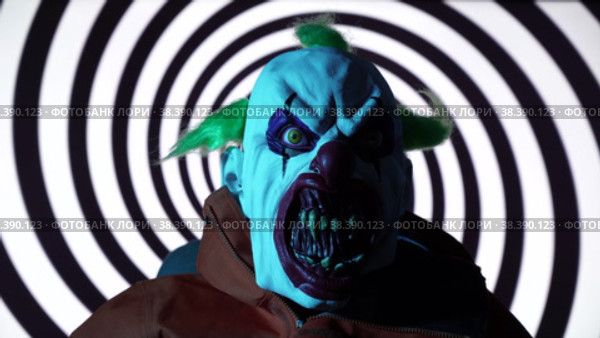 Killer Clown against rotating Monochromatic spiral background. Стоковое видео, видеограф Mihail Mihaylov / Фотобанк Лори