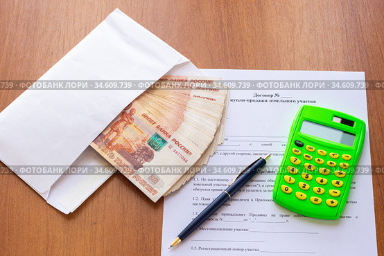 Концепция подписания договора купли продажи земельного участка. Стоковое фото, фотограф Иванов Алексей / Фотобанк Лори