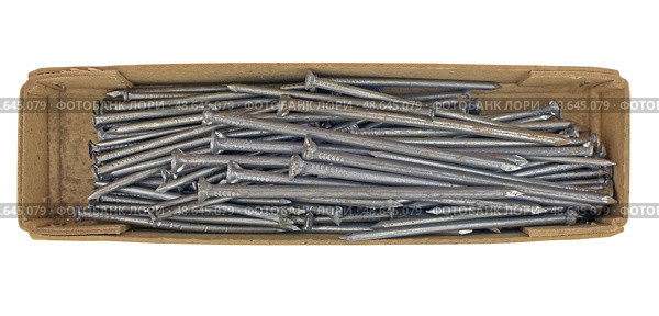 Коробка с гвоздями на белом фоне. Box with nails on white background. Стоковое фото, фотограф Татьяна Д / Фотобанк Лори