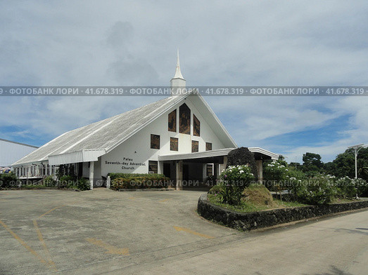 Koror, Palau - July 3, 2017. Palau Seventh Day Adventist church. Церковь адвентистов седьмого дня в Короре, Палау. Редакционное фото, фотограф Александр Кузнецов / Фотобанк Лори