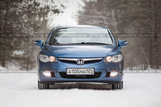 KRASNOYARSK, RUSSIA - December 31, 2020: Blue car. Sedan Honda Civic 4D FD1 2007. Редакционное фото, фотограф Плотников Дмитрий / Фотобанк Лори