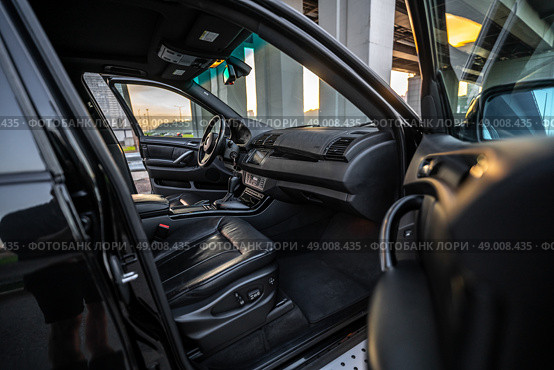 KRASNOYARSK, RUSSIA - May 23, 2025: Black BMW X5 E53. Редакционное фото, фотограф Плотников Дмитрий / Фотобанк Лори