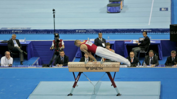 Krisztian Berki - венгерский гимнаст на чемпионате Европы по спортивной гимнастике 2013 года. Москва, СК "Олимпийский". Редакционное видео, видеограф Игорь Долгов / Фотобанк Лори