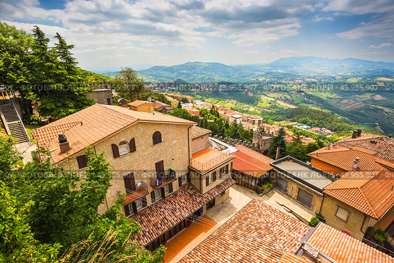 Landscape with roofs of houses in small tuscan town in province (2014 год). Стоковое фото, фотограф Олег Жуков / Фотобанк Лори