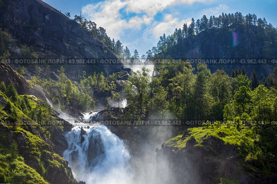 Latefossen Waterfall Odda Norway. Latefoss is a powerful, twin waterfall. Стоковое фото, фотограф Андрей Армягов / Фотобанк Лори