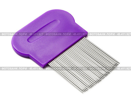 Lice comb with multiple fine teeth for effective lice removal and scalp care. Стоковое фото, фотограф Сергей Толмачёв / Фотобанк Лори