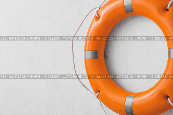 Lifebuoy ring on light background. Стоковое фото, фотограф Pixel_shot / Фотобанк Лори