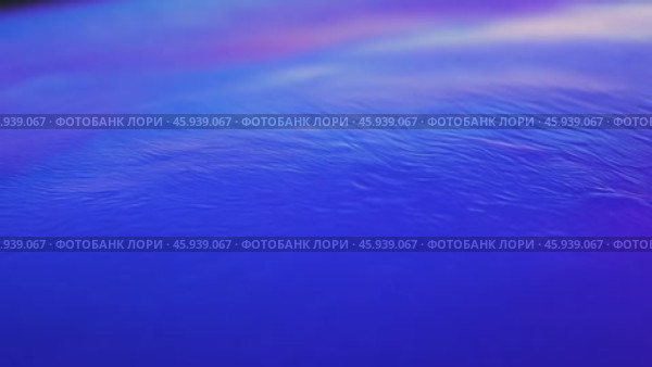 Light reflecting on moving textured surface. Стоковое видео, видеограф Данил Руденко / Фотобанк Лори