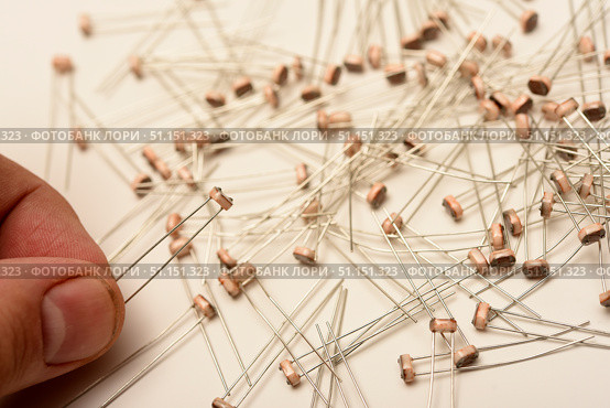 Light resistors. Photoresistors on a white background. Electronic components. Стоковое фото, фотограф Valeriy Lushchikov / Фотобанк Лори