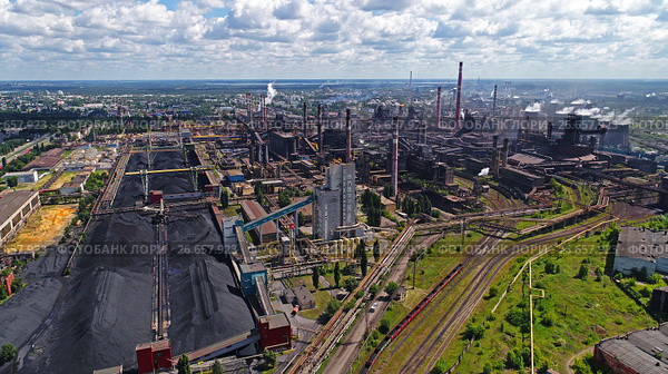 Lipetsk, Russia - July 11. 2017: Metallurgical plant NLMK Group. General view from height. Редакционное фото, фотограф Володина Ольга / Фотобанк Лори