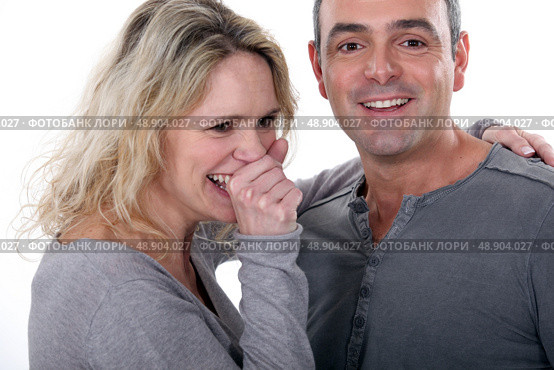 Loving couple in grey. Стоковое фото, агентство Ingram Publishing / Фотобанк Лори