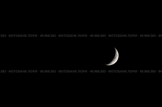 Луна в фазе первой четверти на фоне черного неба. Вид с северного полушария Земли. Стоковое фото, фотограф Алексей Винников / Фотобанк Лори