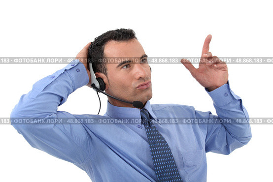 Male call center worker. Стоковое фото, агентство Ingram Publishing / Фотобанк Лори