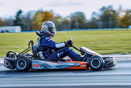 male kart racer drives quickly along the circuit of the autodrome, side view. Стоковое AI-изображение, AI-художник Александр Довянский / Фотобанк Лори