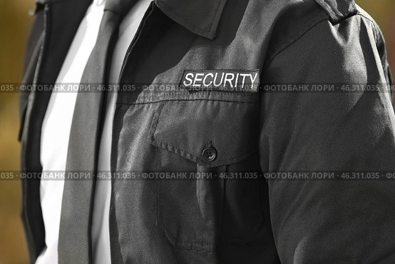 Male security guard outdoors, closeup. Стоковое фото, фотограф Pixel_shot / Фотобанк Лори