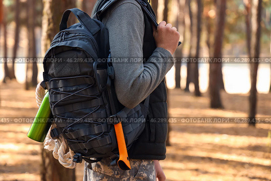 Male tourist with backpack in forest. Стоковое фото, фотограф Pixel_shot / Фотобанк Лори