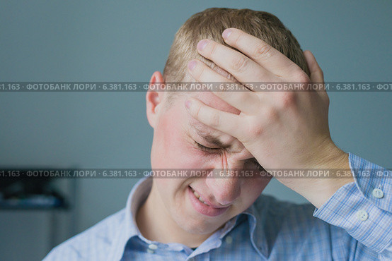 Males sore headache. Стоковое фото, агентство Ingram Publishing / Фотобанк Лори